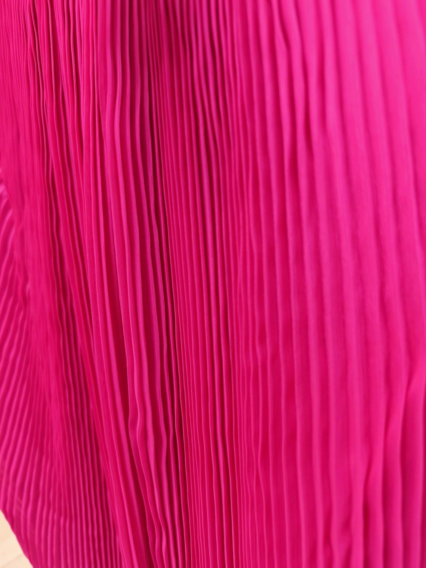 Falda plisada envolvente Aguacatenango  color fucsia, detalle del plisado.