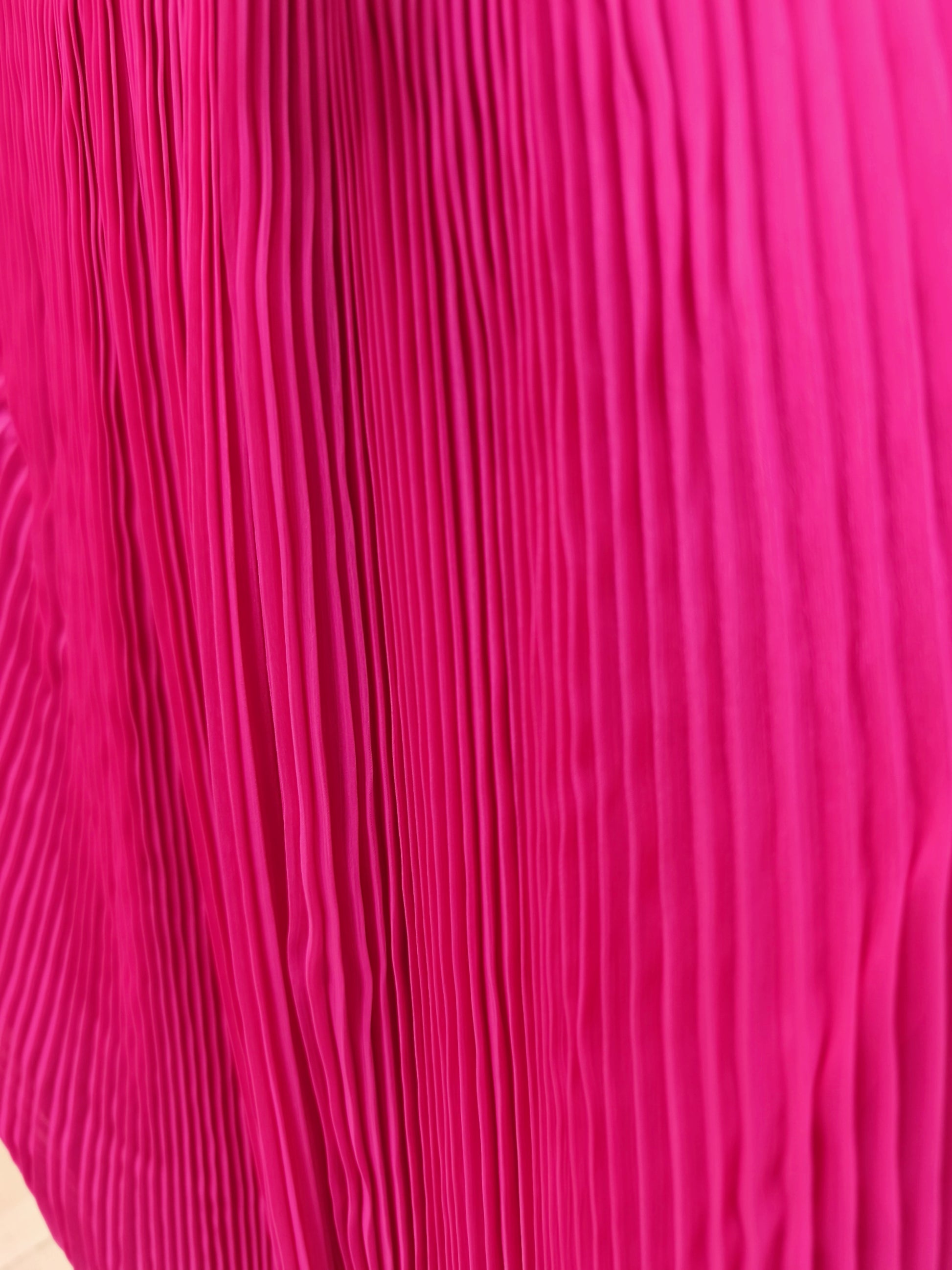 Falda plisada envolvente Aguacatenango  color fucsia, detalle del plisado.