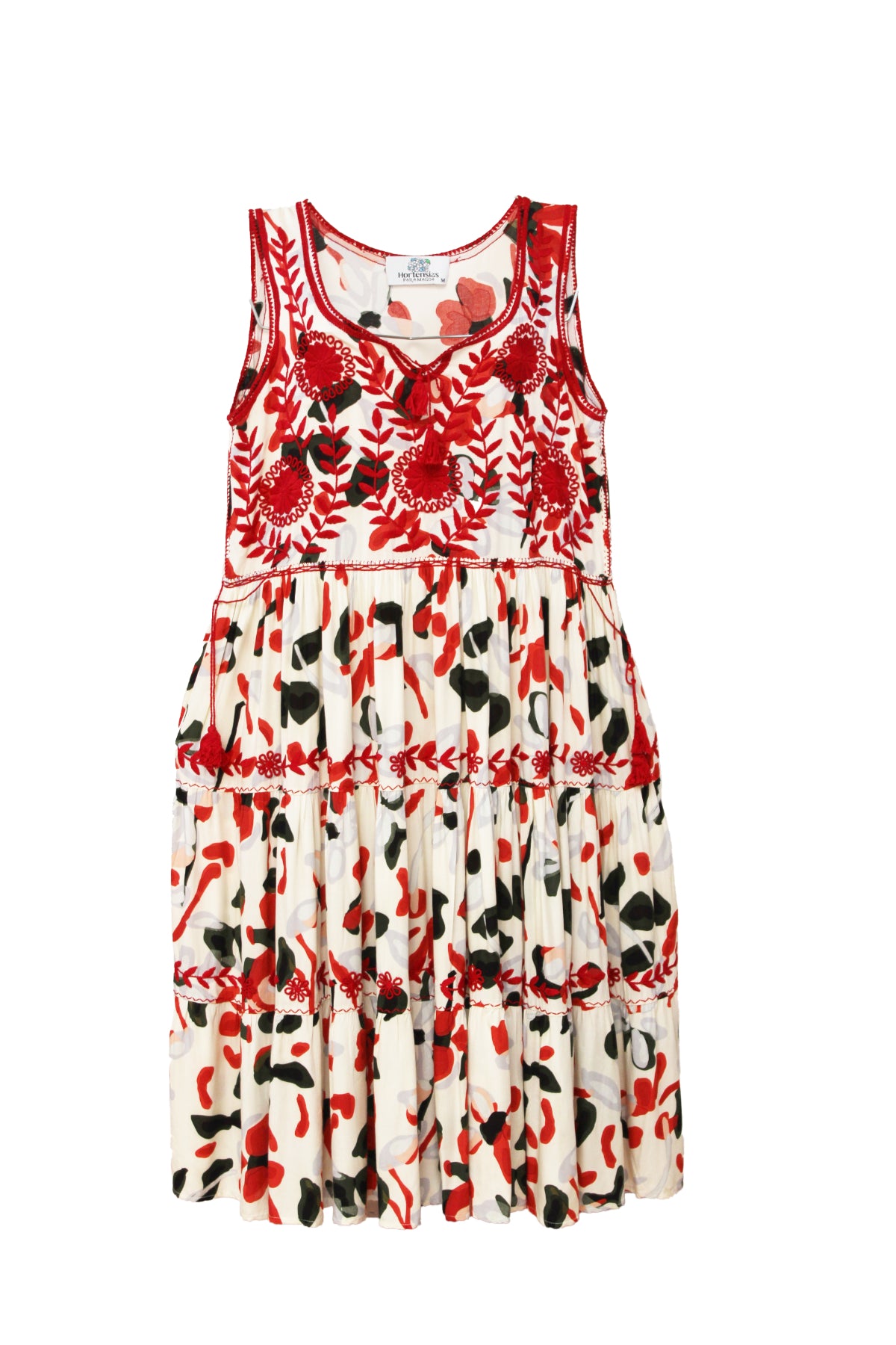 Vestido tradicional Aguacatenango sin mangas en tela blanca con estampado rojo. 